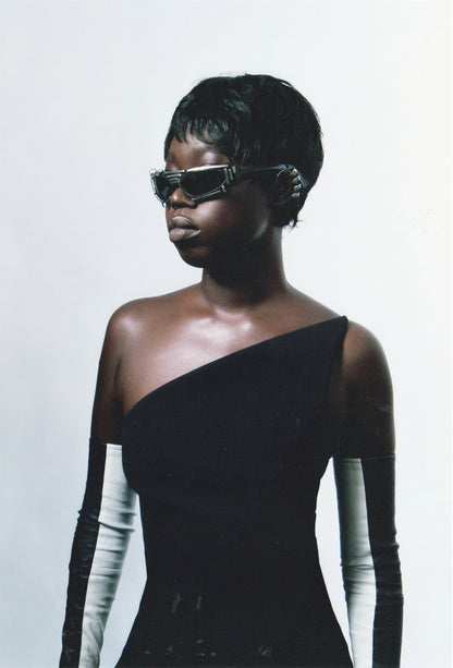 Serpentine ear-cuff