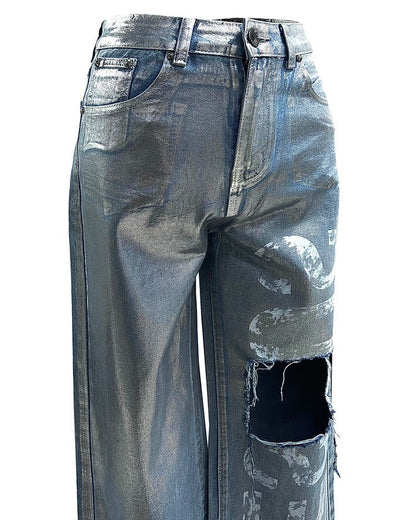 Silver metallic coated denim pants with left front printing and damage points. Made from Cotton 30% /Polyester 70%.