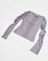 grey longsleeve top with ruched sleeves and back print