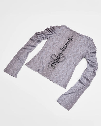 back view of grey longsleeve top with ruched sleeves and back print