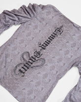 back print of grey longsleeve top with ruched sleeves 