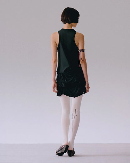 Back view of black top with shirring detail